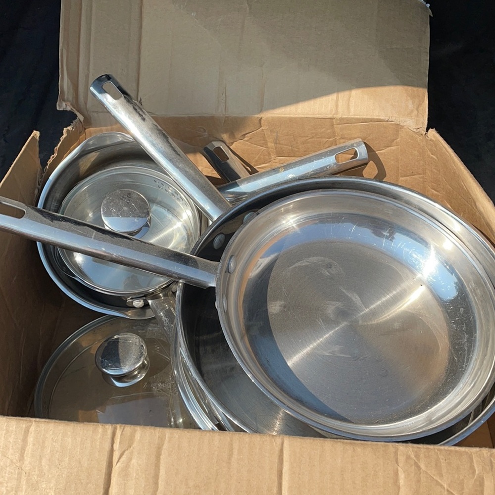 A whole set of Wolfgang Puck pots and pans